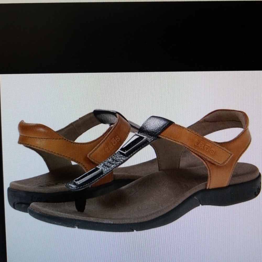 ISO Taos storyteller sandal size 8